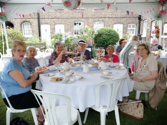 Photos of The Richmond Charities' Afternoon tea with bubbles in the award-winning garden at Michel's Almshouses